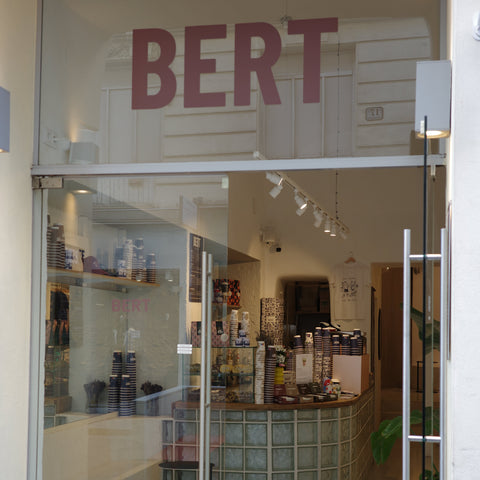 Storefront with glass door and 'BERT' branding